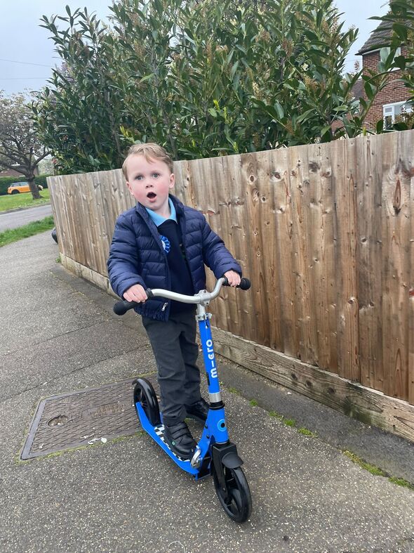 Jesse Browne rides his scooter to keep fit