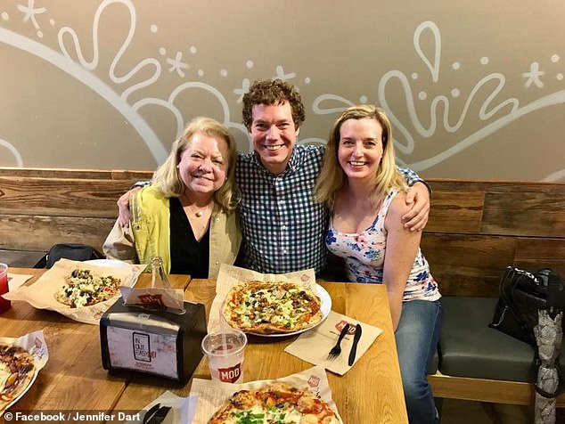 Dart's mother Sherry (left) and sister Jennifer (right) have tried to meet with him many times.  In the photo: The family in happier times