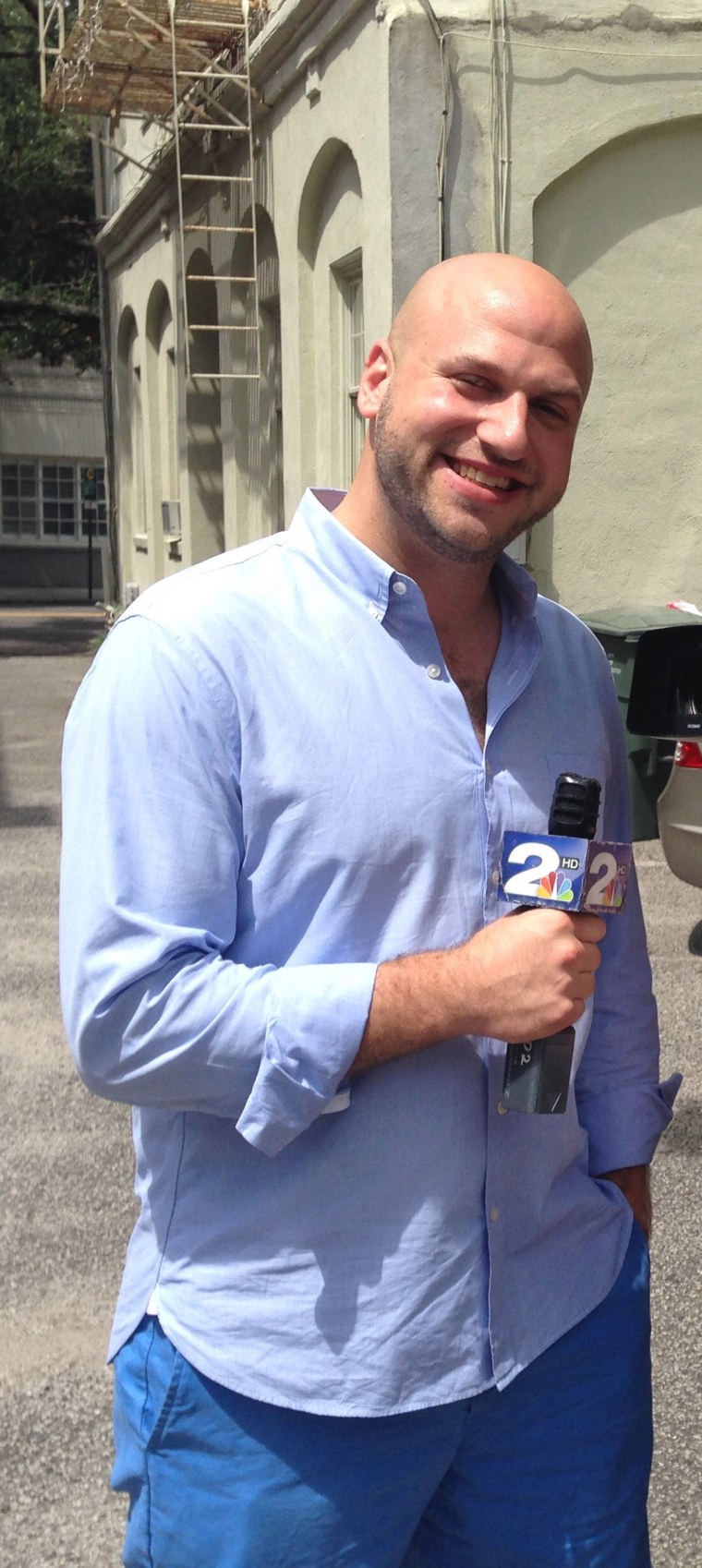 photo of Yosef holding an nbc microphone.  This picture was taken before I started running 