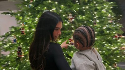 Kendall Jenner hides sister Kylie's son Aire in front of the Christmas tree